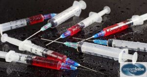 A stack of used syringes (major risk factor for hepatitis/STD transmission)