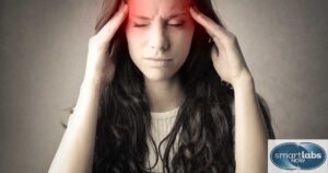 A woman suffering a headache following a CBC blood draw