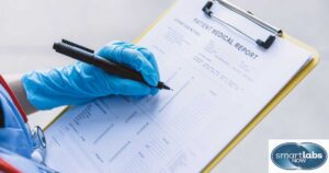 A lab technician writing an EBV patient's test report.