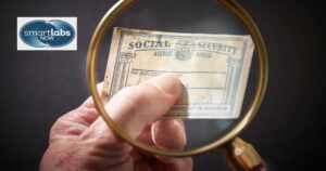 Scrutinizing a job applicant's social security card. 