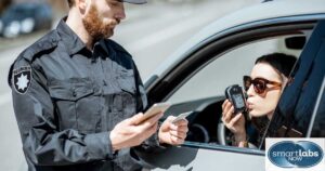 A DUI suspect taking a breath alcohol test.